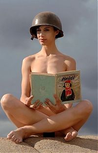 Babes: girl with a helmet reading the book about heidi
