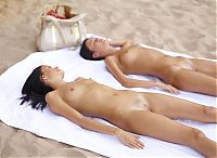 Babes: two young girls sunbathing on the beach
