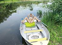 Nake.Me search results: cute young brunette girl in the boat on the pond