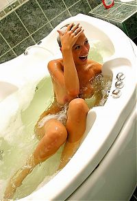 Babes: young blonde girl in the bathtub