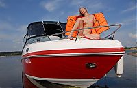 Nake.Me search results: cute young blonde girl with long hair posing on the small yacht
