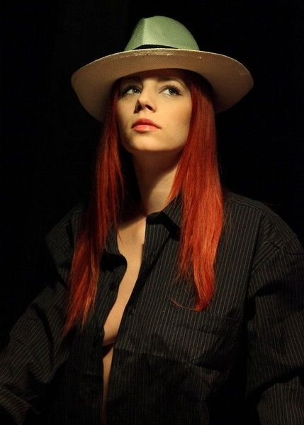 red haired girl in gangster style