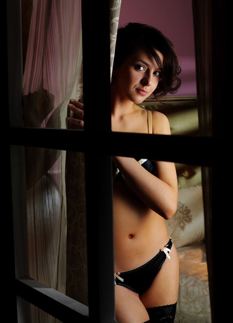 young black haired girl in bedroom