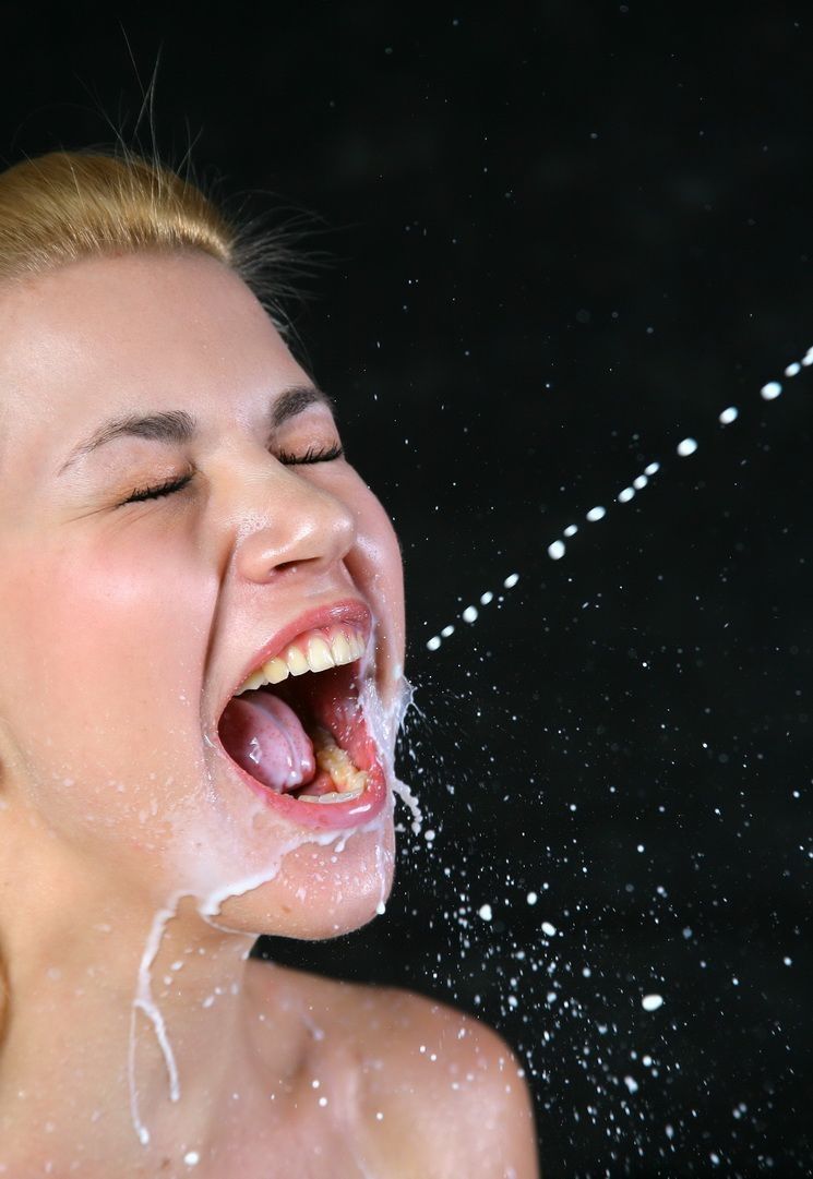 young blonde girl going crazy with milk