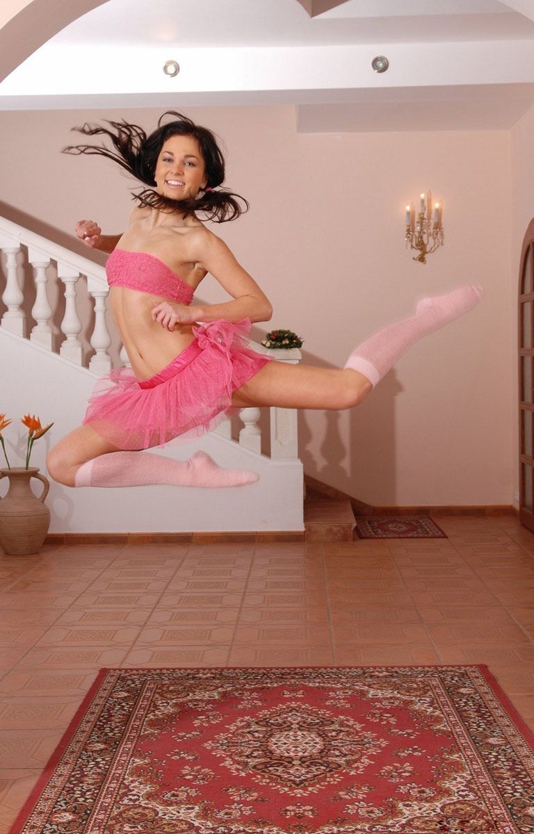 young brunette girl wearing pink clothes