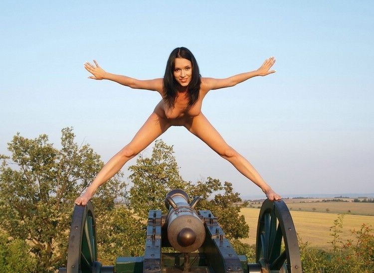 young brunette girl shows off on the cannon