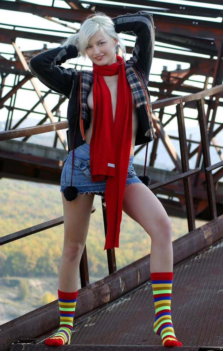 young blonde girl wearing rainbow socks