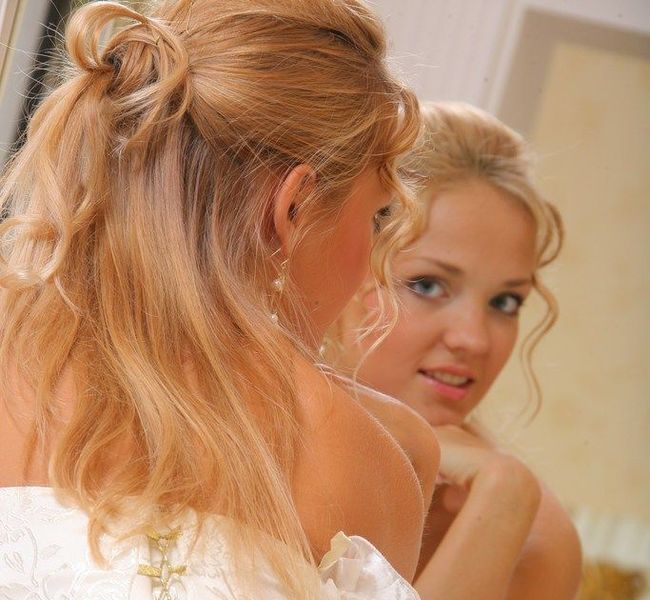 young blonde girl strips from the wedding dress