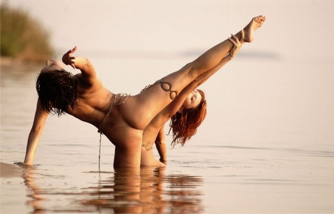 two young girls posing in the lake