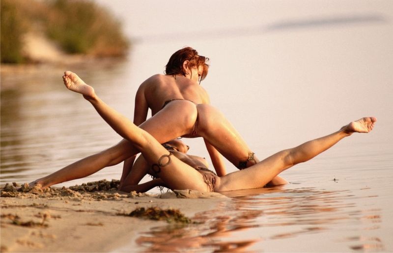 two young girls posing in the lake