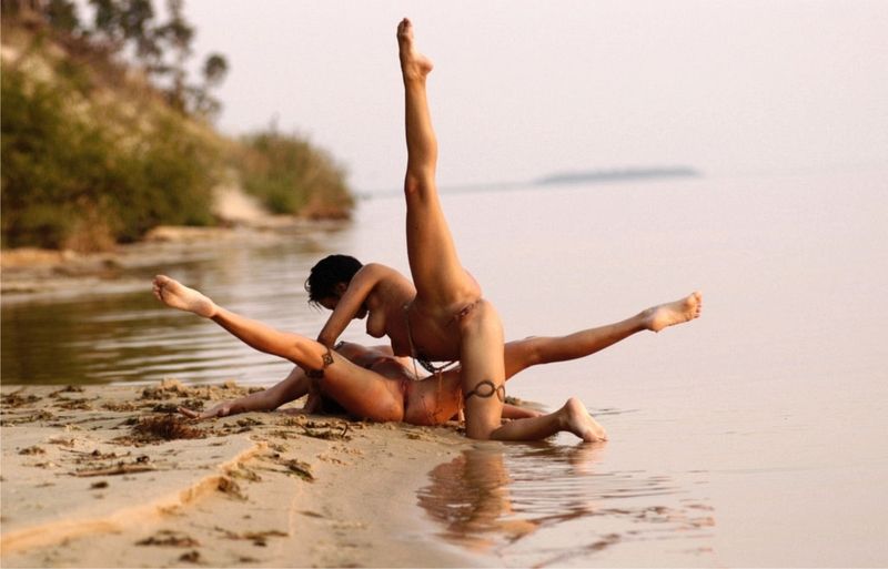 two young girls posing in the lake