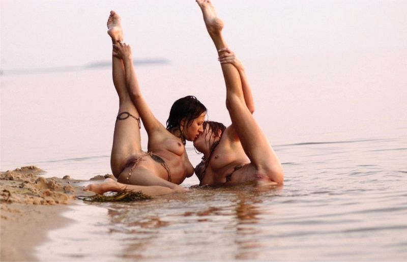 two young girls posing in the lake