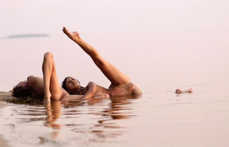 two young girls posing in the lake