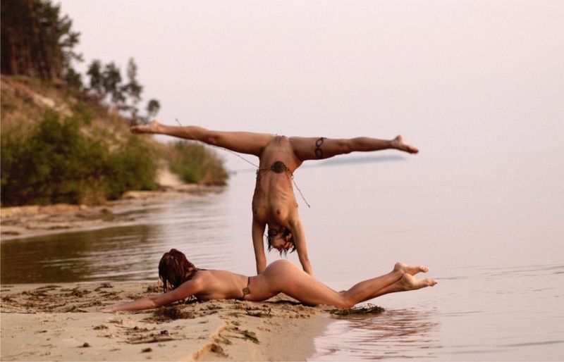 two young girls posing in the lake