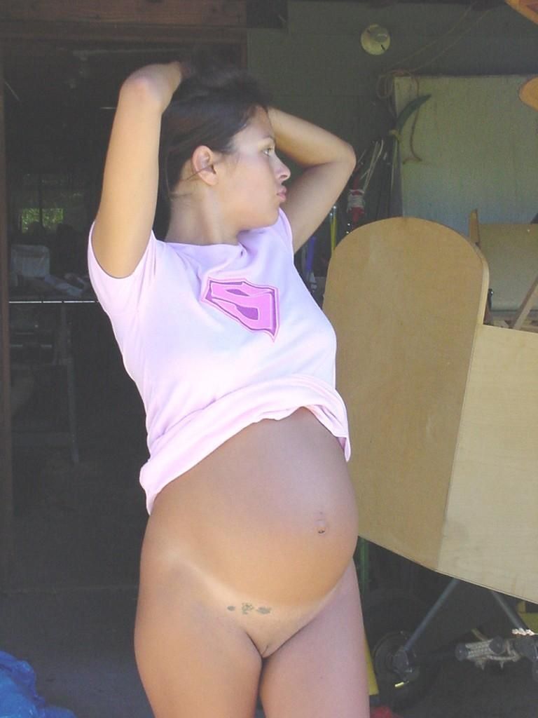 young brunette girl pregnant in her teenage years
