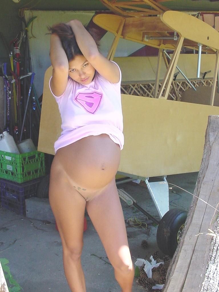 young brunette girl pregnant in her teenage years