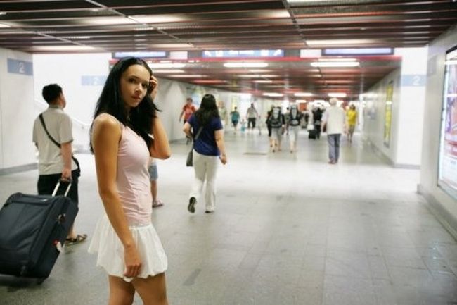 young black haired girl travels in the old train