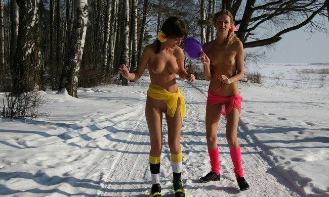 two young girls outside in the winter