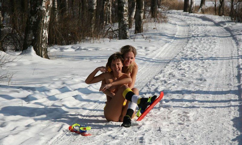 two young girls outside in the winter