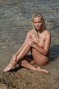 Babes: blonde girl at sea coast