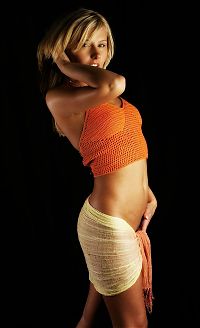 Babes: young blonde girl wearing orange knit shirt