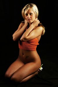 Nake.Me search results: young blonde girl wearing orange knit shirt