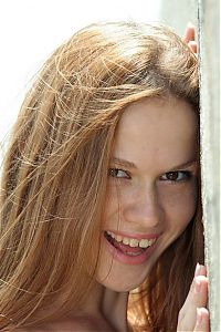 Nake.Me search results: young brunette girl on the wharf by the sea