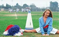 Babes: young blonde girl warms-up with exercises on the playground