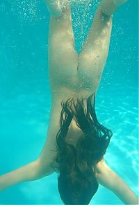 Nake.Me search results: young brunette girl diving in the swimming pool