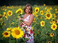 Babes: blonde girl on a field of sunflowers