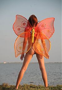 Nake.Me search results: young red haired girl with butterfly wings