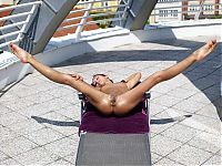 Nake.Me search results: young brunette girl sunbathing on the city terrace