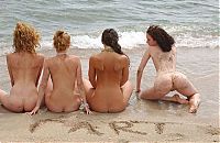 Babes: four young girls relaxing on the beach