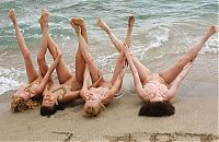 Babes: four young girls relaxing on the beach