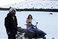 Babes: young brunette girl loves the winter and snowmobiles