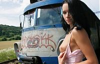 Babes: young black haired girl travels in the old train