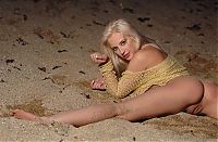 Babes: blonde girl on the beach in the night