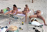 Babes: young girls taking pictures on the beach