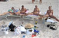 Babes: young girls taking pictures on the beach