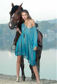 Nake.Me search results: cute young blonde girl posing with a horse