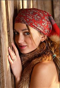 Babes: young blonde girl wearing headscarf in the barn