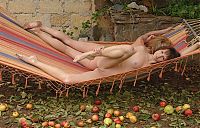 Babes: two young girls outside on the hammock sling