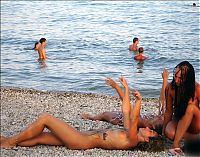 Babes: naked girl naturists on a nude beach