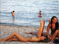 Babes: naked girl naturists on a nude beach