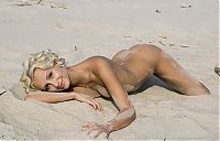 Babes: young curly blonde girl on the beach