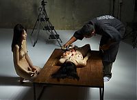 Nake.Me search results: two asian japanese girls practicing a nyotaimori and serving sushi on a naked woman's body