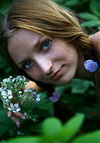 Babes: young skinny brunette girl with pigtails on the rural village road with a scarf