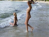 Babes: three cute young girls relaxing on caribbean beach at beautiful sunny day