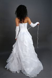 Nake.Me search results: curly black haired girl strips her wedding dress in the studio