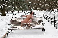 Babes: young black haired girl with a headband and boots outside in the amphitheatre in the winter